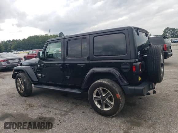 2022 Jeep Wrangler Unlimited Sahara with VIN 1C4HJXENXNW163417, listed as a Copart auction lot 67636985 with 88,314 mi miles and Salvage title. Bid and sale history available at DreamBid. Image 2.