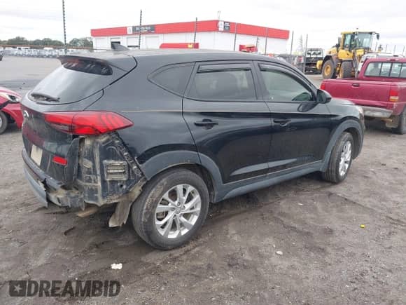 2021 Hyundai Tucson SE with VIN KM8J23A4XMU306246, listed as a IAAI auction lot 43558227 with 66,465 mi miles and . Bid and sale history available at DreamBid. Image 4.