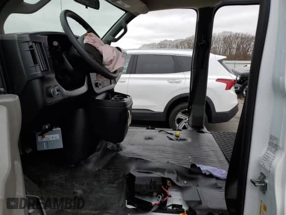2024 Chevrolet Express Cargo with VIN 1GCWGAFPXR1264124, listed as a Copart auction lot 49494635 with Not provided miles and Clean title. Bid and sale history available at DreamBid. Image 7.