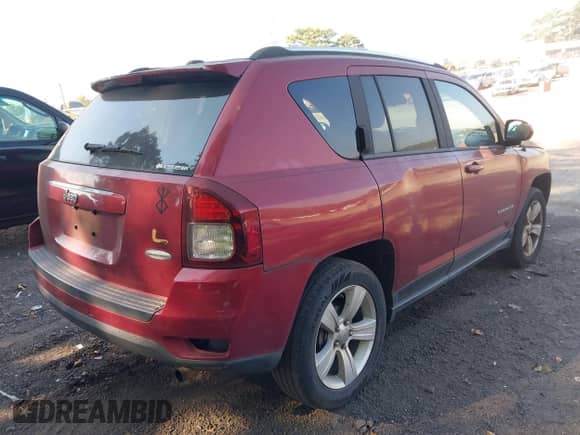 2014 Jeep Compass Latitude with VIN 1C4NJCEB9ED503072, listed as a IAAI auction lot 43257861 with 186,684 mi miles and . Bid and sale history available at DreamBid. Image 4.