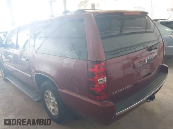 2009 Chevrolet Suburban LTZ with VIN 1GNFC36089J105491, listed as a IAAI auction lot 42509904 with 198,740 mi miles and . Bid and sale history available at DreamBid. Image 3.