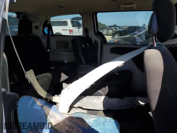 2014 Dodge Grand Caravan SXT z VIN 2C4RDGCG8ER289252, wystawiony jako Copart lot #80755915 z przebiegiem Nie podano mil oraz Szkoda całkowita • Salvage title. Historia ofert i sprzedaży dostępna na DreamBid. Obrazek 11.