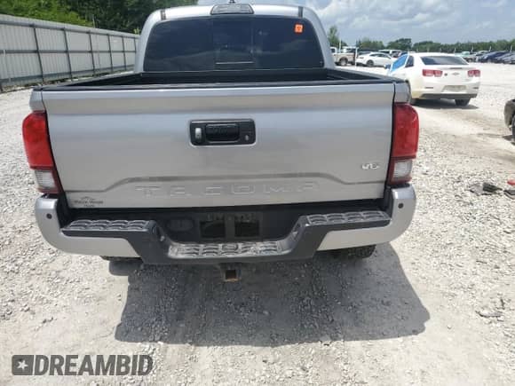2019 Toyota Tacoma SR с VIN 3TMCZ5AN6KM280565, выставлен на аукционе Copart как лот 67002115 с пробегом 72 839 миль миль и Списание • Salvage title. История ставок и продаж доступна на DreamBid. Изображение 6.