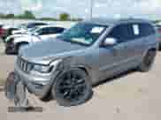 2018 Jeep Grand Cherokee Altitude with VIN 1C4RJEAG7JC181921, listed as a IAAI auction lot 43208554 with 157,255 mi miles and . Bid and sale history available at DreamBid. Image 17.