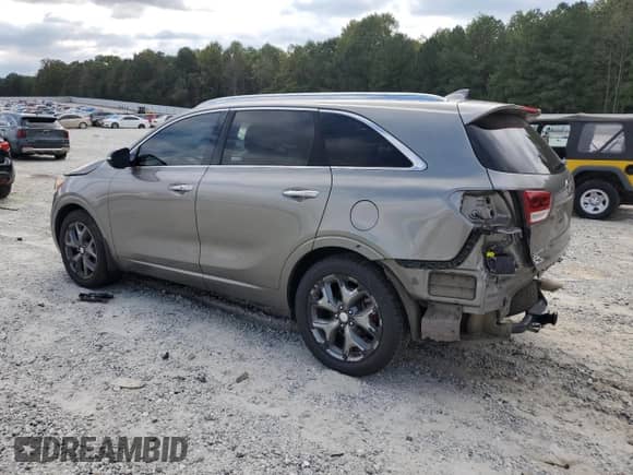 2016 Kia Sorento SX z VIN 5XYPK4A50GG114675, wystawiony jako Copart lot #84562355 z przebiegiem 230 835 mil mil oraz Szkoda całkowita • Salvage title. Historia ofert i sprzedaży dostępna na DreamBid. Obrazek 2.