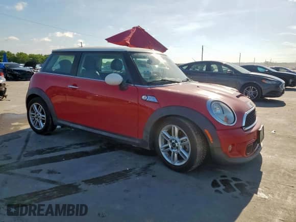 2012 MINI Hardtop S with VIN WMWSV3C50CTY25944, listed as a Copart auction lot 62837575 with 73,618 mi miles and Salvage title. Bid and sale history available at DreamBid. Image 4.