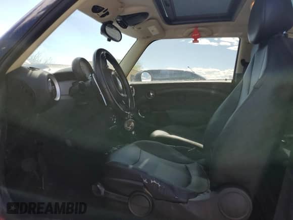 2011 MINI Hardtop with VIN WMWSU3C5XBT093162, listed as a Copart auction lot 54871315 with 171,220 mi miles and Salvage title. Bid and sale history available at DreamBid. Image 7.