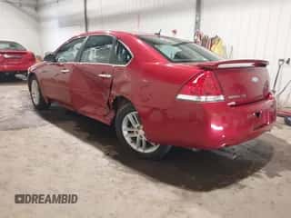 2014 Chevrolet Impala LTZ with VIN 2G1WC5E34E1103508, listed as a IAAI auction lot 42660804 with 148,857 mi miles and . Bid and sale history available at DreamBid. Image 3.
