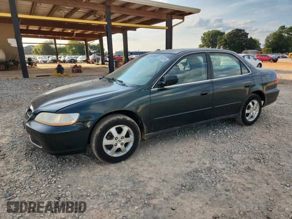 2000 Honda Accord SE with VIN 1HGCG5670YA058305, listed as a Copart auction lot 72060755 with 194,420 mi miles and Salvage title. Bid and sale history available at DreamBid. Image 1.