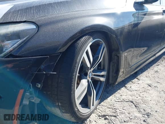 2016 BMW 7 Series 750i xDrive with VIN WBA7F2C5XGG415731, listed as a IAAI auction lot 43302211 with 113,001 mi miles and . Bid and sale history available at DreamBid. Image 17.
