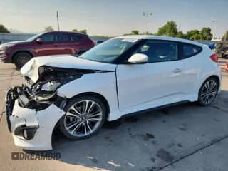 2016 Hyundai Veloster Turbo с VIN KMHTC6AE8GU295171, выставлен на аукционе Copart как лот 71407595 с пробегом 72 818 миль миль и Списание • Salvage title. История ставок и продаж доступна на DreamBid. Изображение 1.