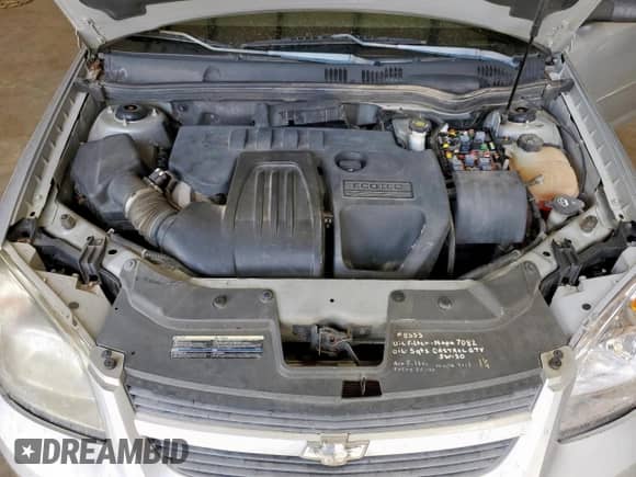 2009 Chevrolet Cobalt LS z VIN 1G1AS58H697158555, wystawiony jako Copart lot #82312565 z przebiegiem Nie podano mil oraz Szkoda całkowita • Salvage title. Historia ofert i sprzedaży dostępna na DreamBid. Obrazek 11.