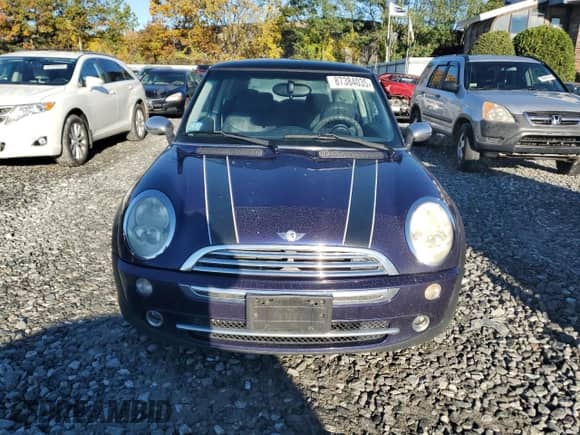 2005 MINI Hardtop with VIN WMWRC33405TC56434, listed as a Copart auction lot 87384035 with 99,950 mi miles and Clean title. Bid and sale history available at DreamBid. Image 5.