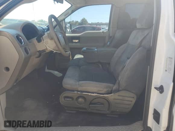 2005 Ford F-150 STX with VIN 1FTRX12WX5FA71172, listed as a Copart auction lot 86429595 with 184,726 mi miles and Salvage title. Bid and sale history available at DreamBid. Image 7.