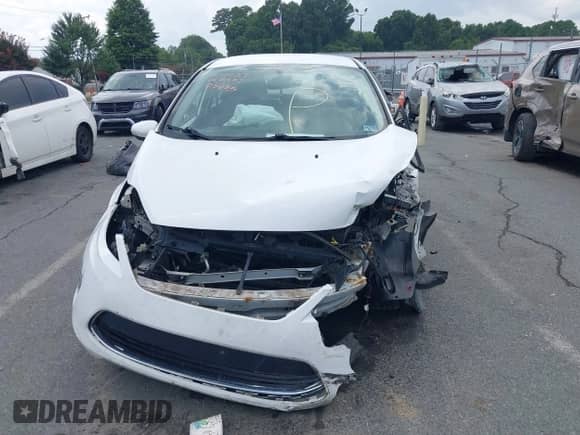 2012 Ford Fiesta SES with VIN 3FADP4FJ5CM183357, listed as a IAAI auction lot 42798122 with 147,657 mi miles and . Bid and sale history available at DreamBid. Image 12.