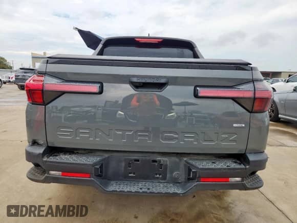 2024 Hyundai Santa Cruz SEL с VIN 5NTJBDAE0RH079803, выставлен на аукционе Copart как лот 68621445 с пробегом 89 955 миль миль и Чистый • Clean title. История ставок и продаж доступна на DreamBid. Изображение 6.