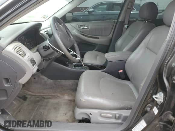 1998 Honda Accord EX with VIN 1HGCG165XWA032203, listed as a Copart auction lot 60236725 with 141,292 mi miles and Salvage title. Bid and sale history available at DreamBid. Image 7.