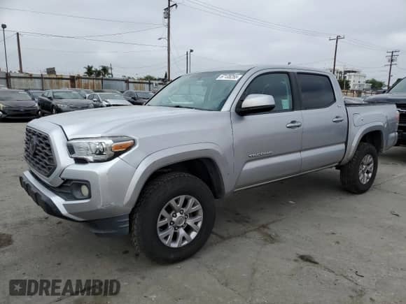2016 Toyota Tacoma SR5 с VIN 5TFAX5GN7GX052127, выставлен на аукционе Copart как лот 67135255 с пробегом 153 012 миль миль и Списание • Salvage title. История ставок и продаж доступна на DreamBid. Изображение 1.