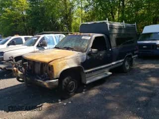 1995 Chevrolet Silverado 2500 с VIN 1GCFK24KXSZ147923, выставлен на аукционе Copart как лот 55606345 с пробегом Не указан миль и На запчасти • Non repairable. История ставок и продаж доступна на DreamBid. Изображение 1.