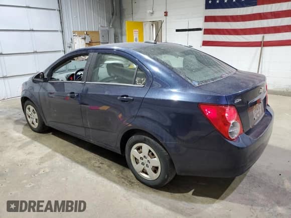 2015 Chevrolet Sonic LS with VIN 1G1JB5SH0F4180086, listed as a Copart auction lot 70201525 with 206,625 mi miles and Salvage title. Bid and sale history available at DreamBid. Image 2.