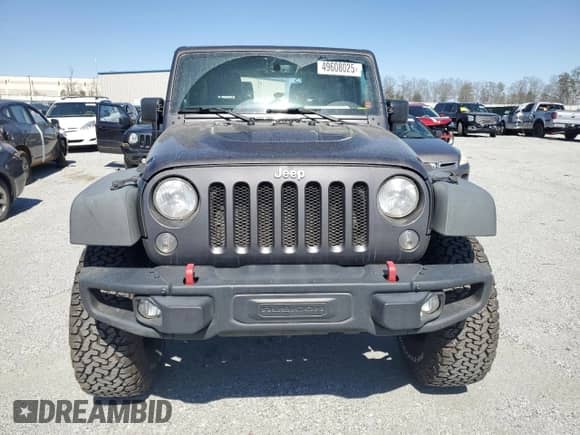 2014 Jeep Wrangler Rubicon with VIN 1C4BJWCG7EL256627, listed as a Copart auction lot 49608025 with 149,428 mi miles and Salvage title. Bid and sale history available at DreamBid. Image 5.