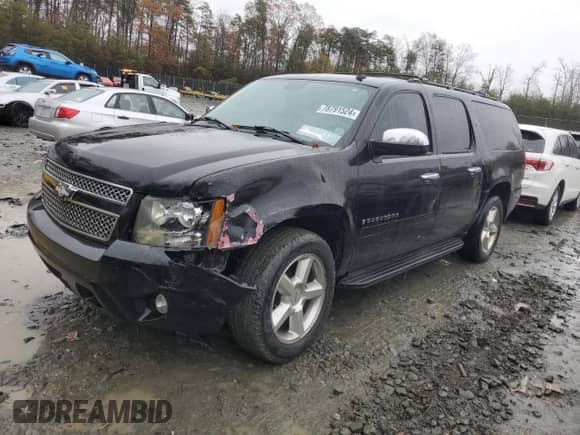 2008 Chevrolet Suburban LTZ with VIN 1GNFK16YX8R122709, listed as a Copart auction lot 78791524 with 265,847 mi miles and Salvage title. Bid and sale history available at DreamBid. Image 1.
