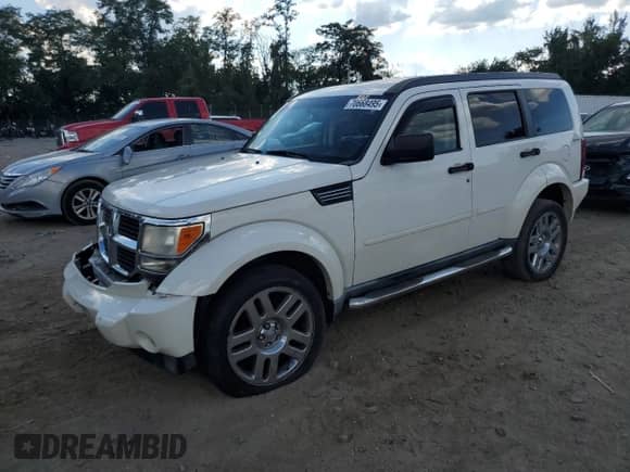 2009 Dodge Nitro SLT with VIN 1D8GU58KX9W532941, listed as a Copart auction lot 70668495 with 160,311 mi miles and Salvage title. Bid and sale history available at DreamBid. Image 1.