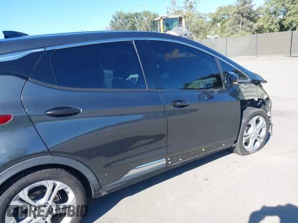 2021 Chevrolet Bolt EV LT z VIN 1G1FY6S05M4107619, wystawiony jako IAAI lot #43252706 z przebiegiem 79 416 mil mil oraz . Historia ofert i sprzedaży dostępna na DreamBid. Obrazek 6.