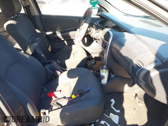 2004 Dodge Neon SXT with VIN 1B3ES56C34D620243, listed as a IAAI auction lot 43104959 with 223,134 mi miles and . Bid and sale history available at DreamBid. Image 5.