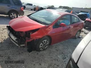 2016 Toyota Prius Three Touring z VIN JTDKARFU3G3513921, wystawiony jako Copart lot #70997175 z przebiegiem 149 132 mil mil oraz Czysty tytuł • Clean title. Historia ofert i sprzedaży dostępna na DreamBid. Obrazek 1.