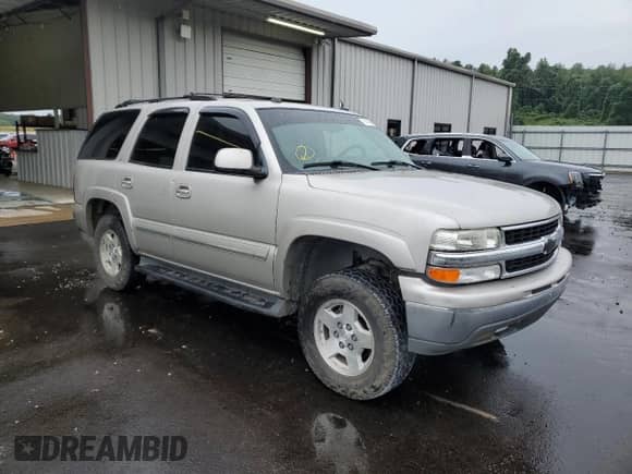 2004 Chevrolet Tahoe LT with VIN 1GNEC13Z54R264420, listed as a Copart auction lot 70382425 with 201,894 mi miles and Salvage title. Bid and sale history available at DreamBid. Image 4.
