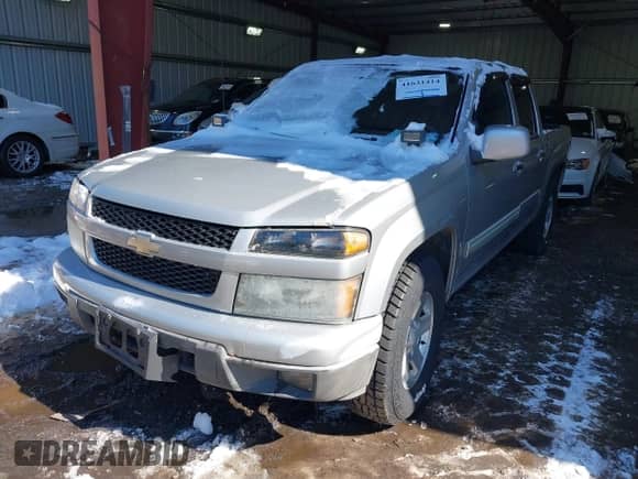 2010 Chevrolet Colorado 1LT z VIN 1GCDSCDE0A8101688, wystawiony jako IAAI lot #41631414 z przebiegiem 220 308 mil mil oraz . Historia ofert i sprzedaży dostępna na DreamBid. Obrazek 2.