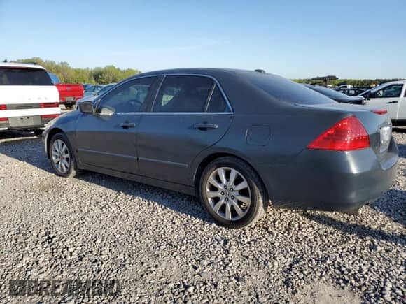 2007 Honda Accord EX-L z VIN 1HGCM665X7A011133, wystawiony jako Copart lot #52516015 z przebiegiem 160 141 mil mil oraz Czysty tytuł • Clean title. Historia ofert i sprzedaży dostępna na DreamBid. Obrazek 2.