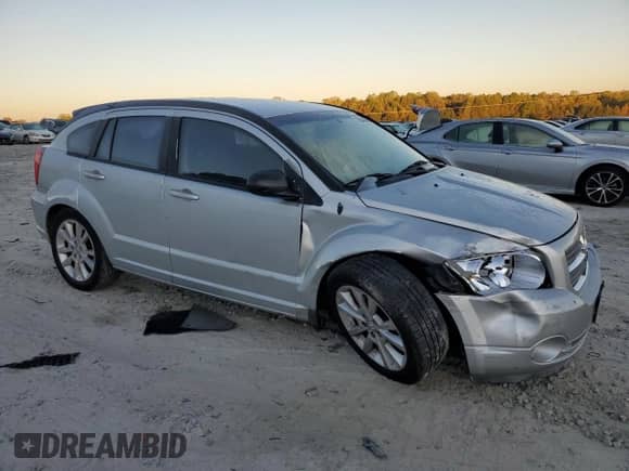 2011 Dodge Caliber Heat with VIN 1B3CB5HA3BD228623, listed as a Copart auction lot 86464045 with 175,328 mi miles and Salvage title. Bid and sale history available at DreamBid. Image 4.