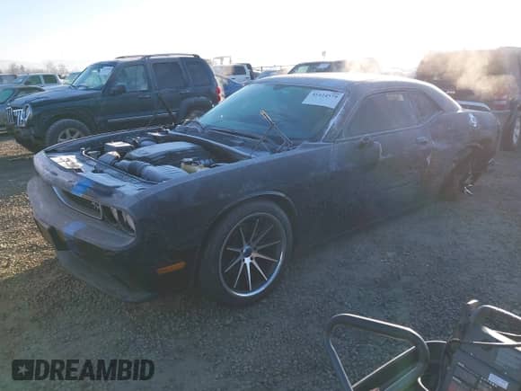 2013 Dodge Challenger R/T с VIN 2C3CDYBT1DH501055, выставлен на аукционе IAAI как лот 41424579 с пробегом 156 492 миль миль и . История ставок и продаж доступна на DreamBid. Изображение 18.