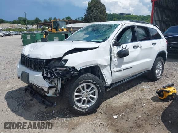 2020 Jeep Grand Cherokee Laredo E with VIN 1C4RJFAG4LC143667, listed as a IAAI auction lot 42847717 with 51,387 mi miles and . Bid and sale history available at DreamBid. Image 2.