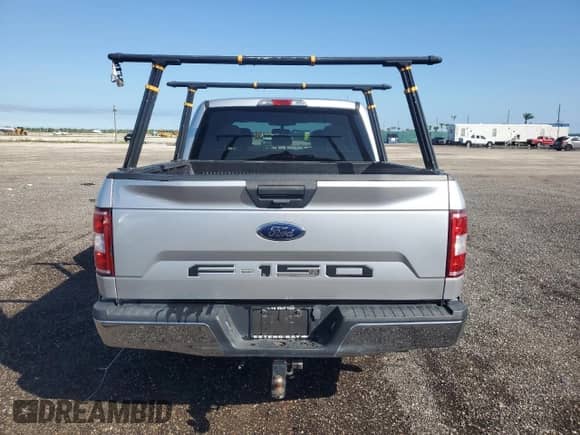 2019 Ford F-150 XL z VIN 1FTEW1C55KFA64312, wystawiony jako Copart lot #85894015 z przebiegiem 104 464 mil mil oraz Szkoda całkowita • Salvage title. Historia ofert i sprzedaży dostępna na DreamBid. Obrazek 6.