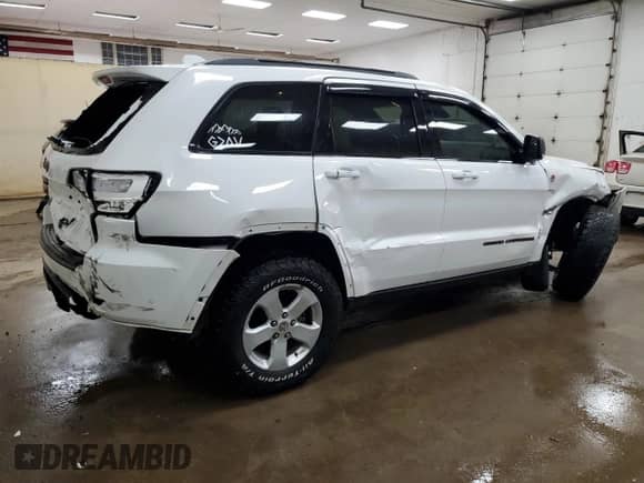 2019 Jeep Grand Cherokee Trailhawk with VIN 1C4RJFLG4KC581794, listed as a Copart auction lot 63522335 with 122,407 mi miles and Clean title. Bid and sale history available at DreamBid. Image 3.