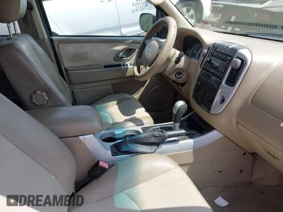 2007 Mercury Mariner Premier with VIN 4M2CU971X7KJ11054, listed as a IAAI auction lot 42813499 with 151,165 mi miles and . Bid and sale history available at DreamBid. Image 5.