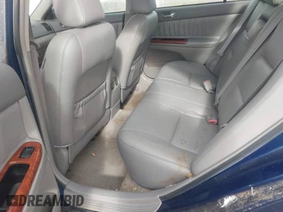 2005 Toyota Camry LE z VIN 4T1BF30K35U091920, wystawiony jako IAAI lot #43581408 z przebiegiem 130 454 mil mil oraz . Historia ofert i sprzedaży dostępna na DreamBid. Obrazek 8.