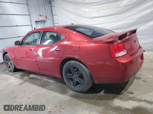 2010 Dodge Charger R/T with VIN 2B3CA5CT8AH172076, listed as a Copart auction lot 84264895 with 191,913 mi miles and Salvage title. Bid and sale history available at DreamBid. Image 2.