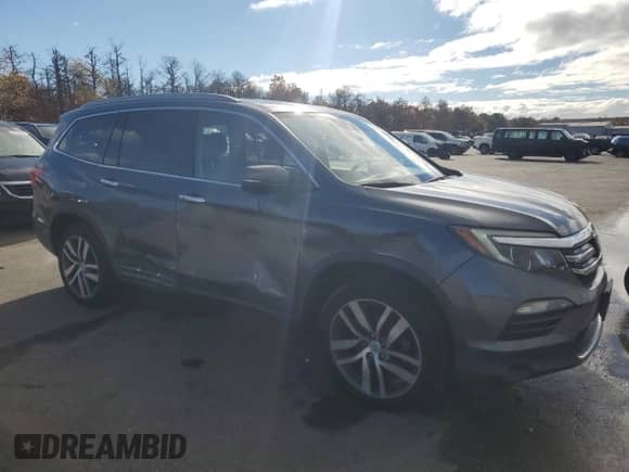2016 Honda Pilot Elite с VIN 5FNYF6H00GB100829, выставлен на аукционе Copart как лот 90035285 с пробегом 123 274 миль миль и Списание • Salvage title. История ставок и продаж доступна на DreamBid. Изображение 4.