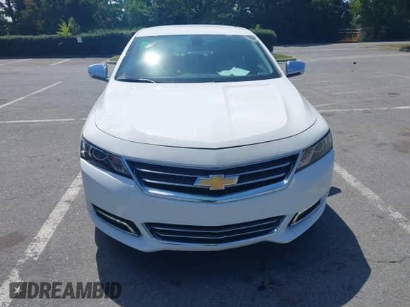 2018 Chevrolet Impala LT with VIN 1G1105S32JU142880, listed as a IAAI auction lot 43205266 with 141,783 mi miles and . Bid and sale history available at DreamBid. Image 6.