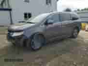 2015 Honda Odyssey Touring Elite с VIN 5FNRL5H94FB054149, выставлен на аукционе Copart как лот 81888025 с пробегом 132 603 миль миль и Списание • Salvage title. История ставок и продаж доступна на DreamBid. Изображение 1.