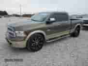 2014 Ram 1500 Longhorn Limited z VIN 1C6RR7WM6ES423250, wystawiony jako Copart lot #69193804 z przebiegiem 148 863 mil mil oraz Szkoda całkowita • Salvage title. Historia ofert i sprzedaży dostępna na DreamBid. Obrazek 1.