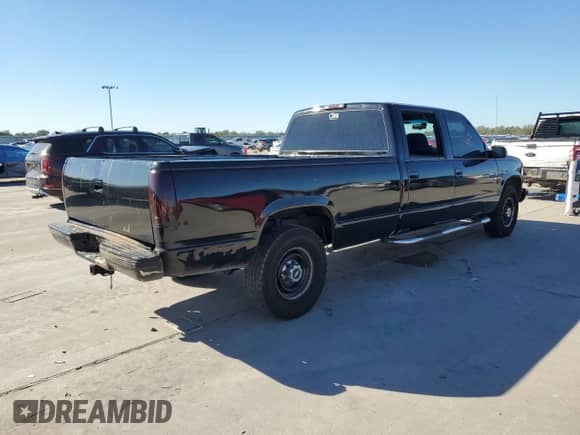 1996 Chevrolet Silverado 3500 with VIN 1GCGC33R8TF009659, listed as a Copart auction lot 80885044 with 176,561 mi miles and Salvage title. Bid and sale history available at DreamBid. Image 3.