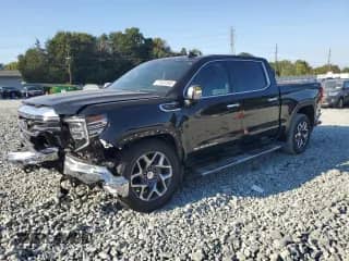 2023 GMC Sierra 1500 SLT with VIN 3GTUUDED0PG169885, listed as a Copart auction lot 71402045 with 57,205 mi miles and Salvage title. Bid and sale history available at DreamBid. Image 1.
