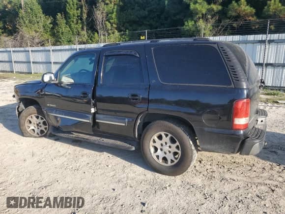 2003 Chevrolet Tahoe LT with VIN 1GNEC13Z93J171106, listed as a Copart auction lot 80452125 with 330,805 mi miles and Salvage title. Bid and sale history available at DreamBid. Image 2.
