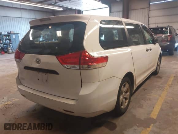 2013 Toyota Sienna L with VIN 5TDZK3DC4DS326541, listed as a IAAI auction lot 42861022 with 304,238 mi miles and . Bid and sale history available at DreamBid. Image 4.
