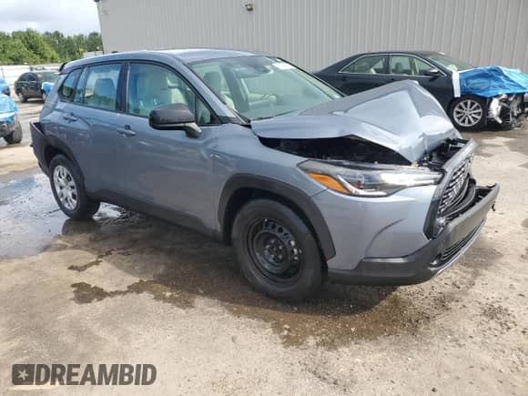 2022 Toyota Corolla Cross L with VIN 7MUAAAAG5NV014375, listed as a Copart auction lot 68049755 with 34,148 mi miles and Salvage title. Bid and sale history available at DreamBid. Image 4.